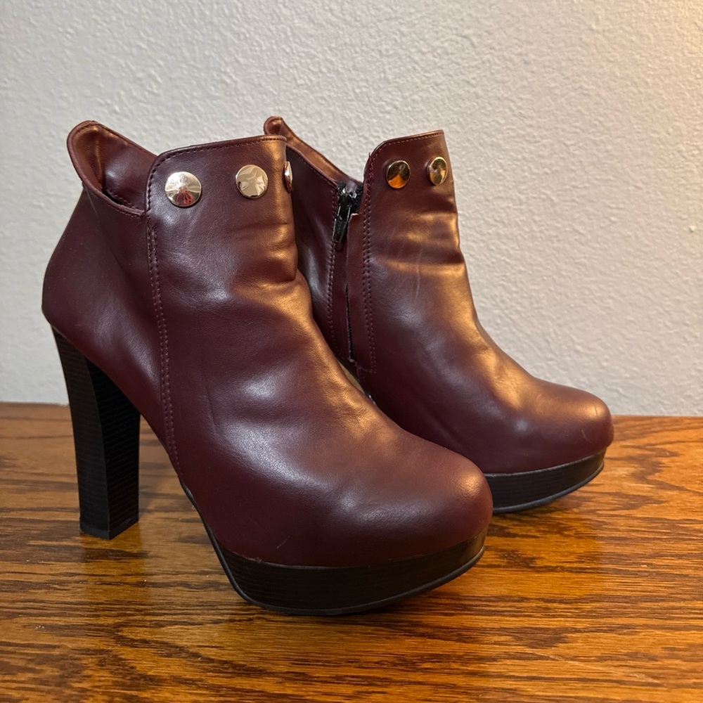 Cklass Burgundy boot with gold button embellishments and side zip size 9